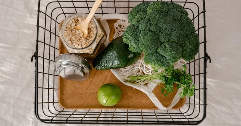 A basket of fresh produce and oats promoting a healthy and sustainable lifestyle.