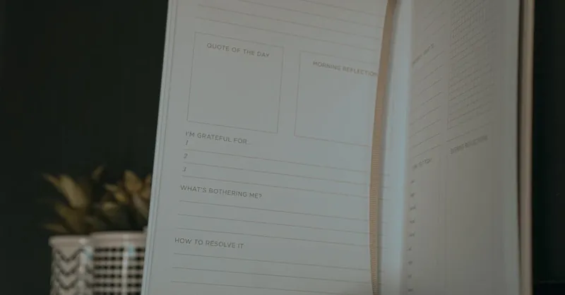 An open journal with sections for quotes, reflections, and gratitude.