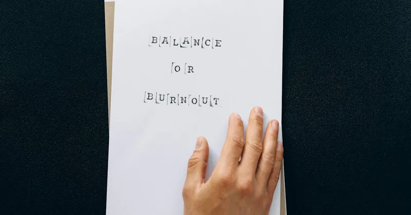 Hand holding paper with